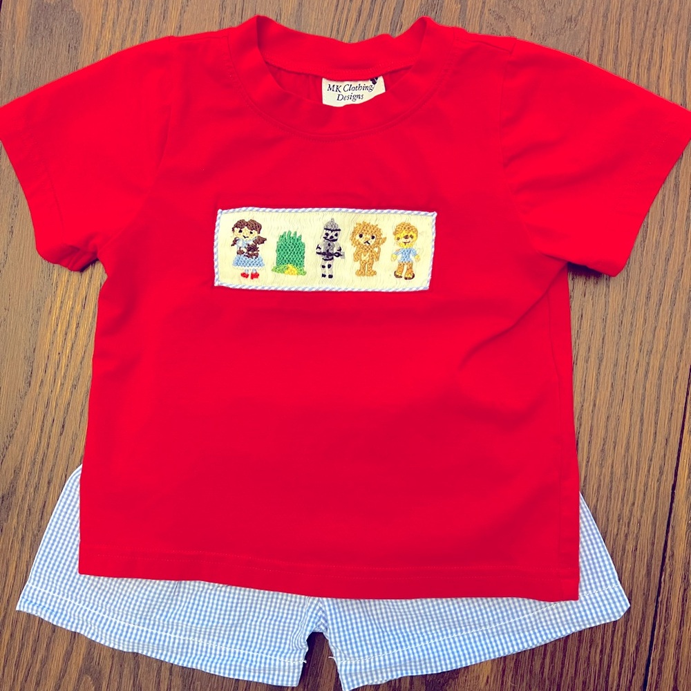 Taking to consignment tomorrow Smocked wizard of Oz set